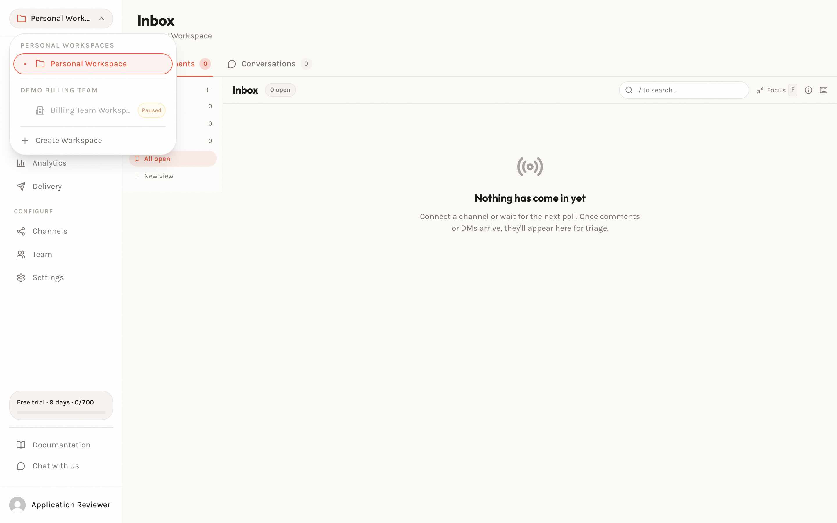 The workspace switcher open over the Inbox, with the personal workspace selectable and the team workspace carrying a Paused chip